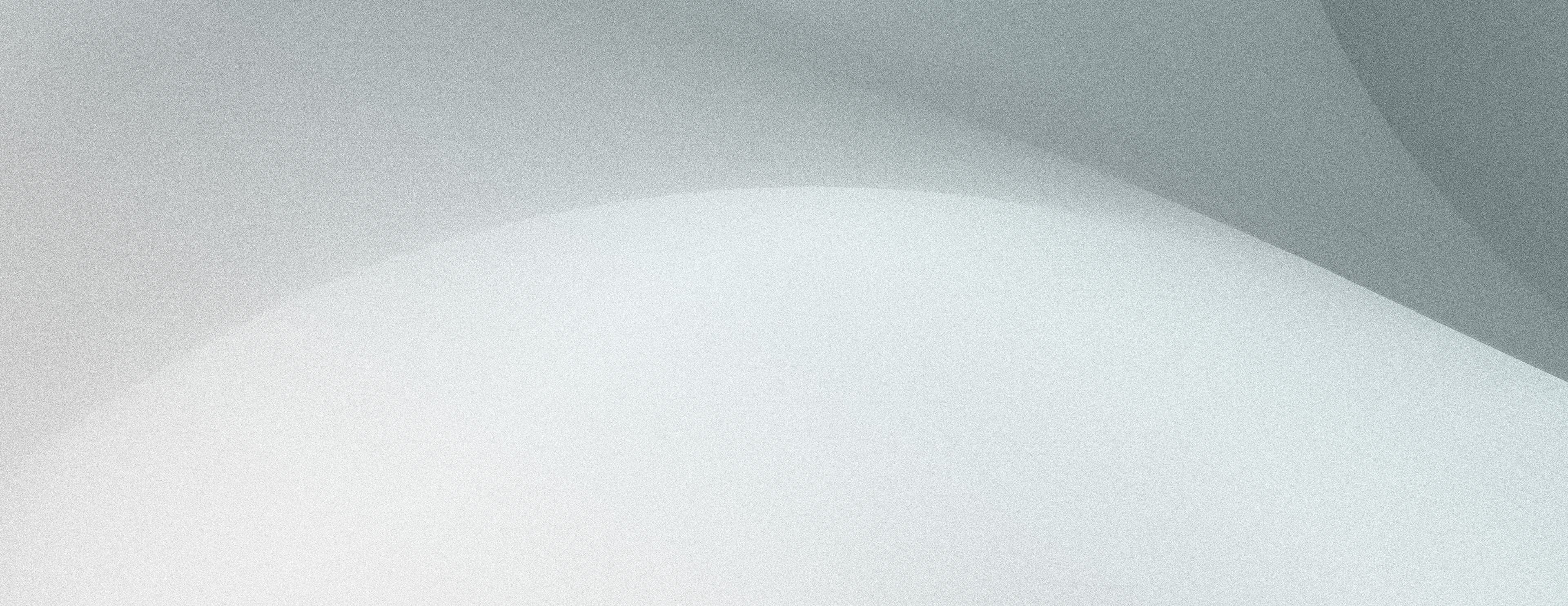 Abstraktes, minimalistisches Hintergrundbild mit sanften grauen Farbtönen, ideal für eine entspannende Atmosphäre bei der Präsentation von CBD-Produkten.